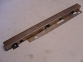 A-48300 Left Side Front Door Window Felt Holder- This is the metal piece that fastens to the inside front edge of the Slant Windshield 4 door, Victoria, and Slant Windshield Cabriolet doors that holds the felts, and the window frame bolts to it.